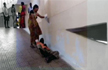 At Andhra Hospital, wife had to drag him behind her up a ramp